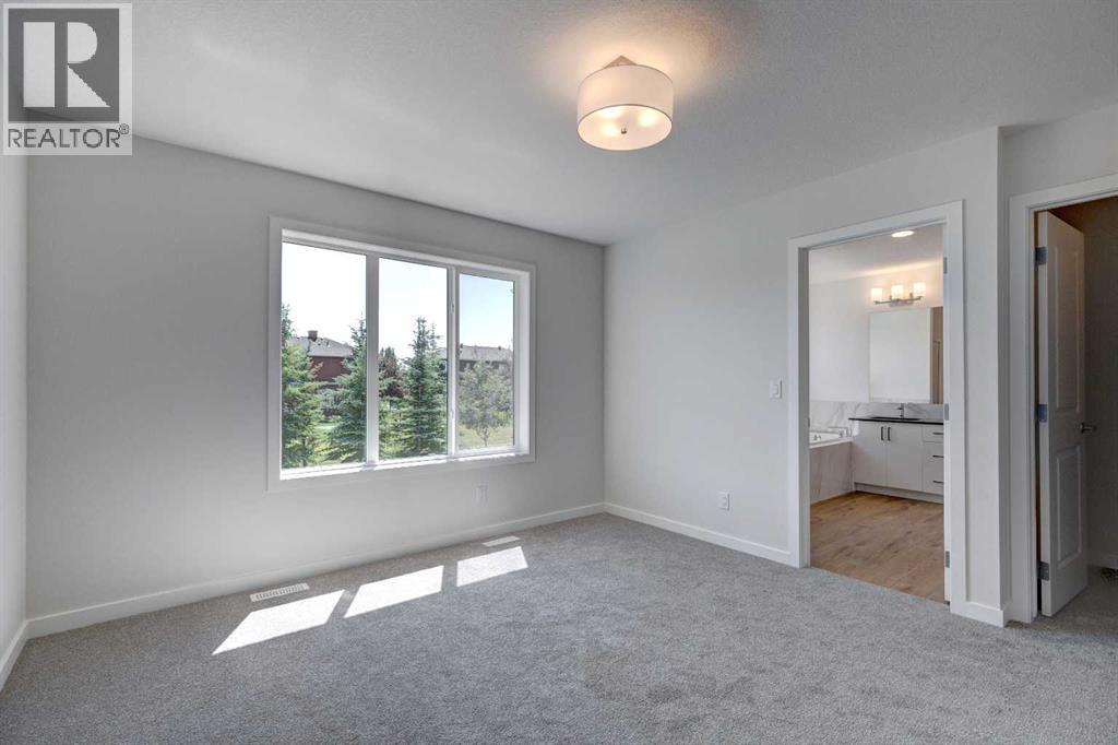 Photo 23 of 77 Silver Spruce Court Sw, Calgary AB
