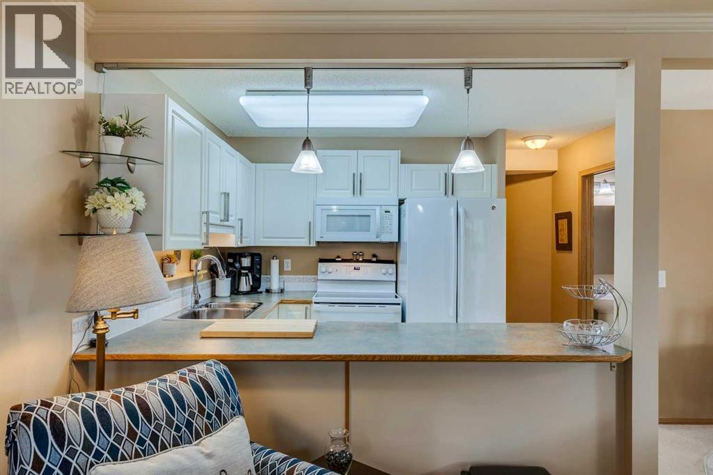 Photo 7 of 139 Country Hills Villas Nw, Calgary AB