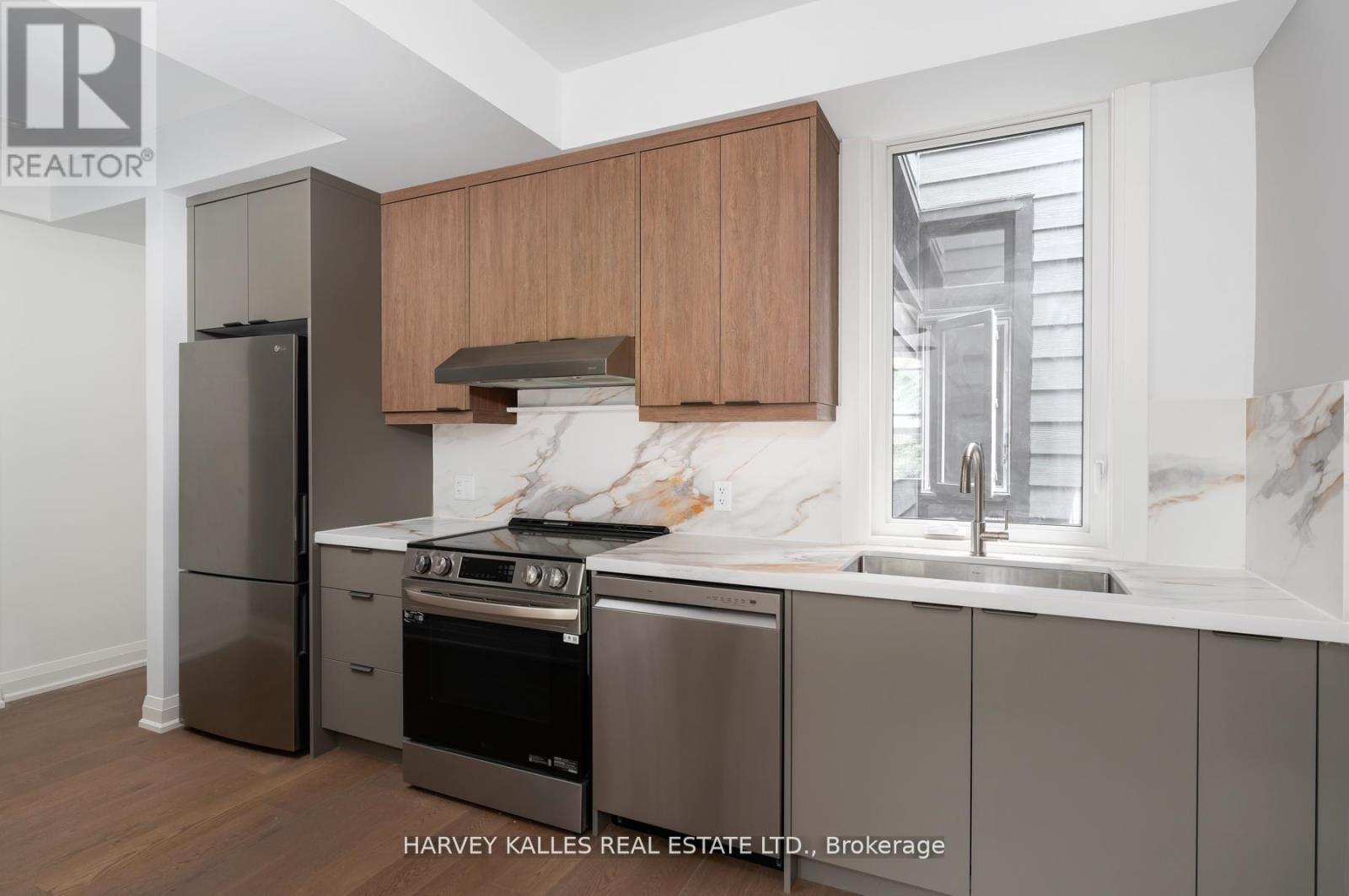 Photo 7 of Main 24 Sullivan Street, Toronto ON