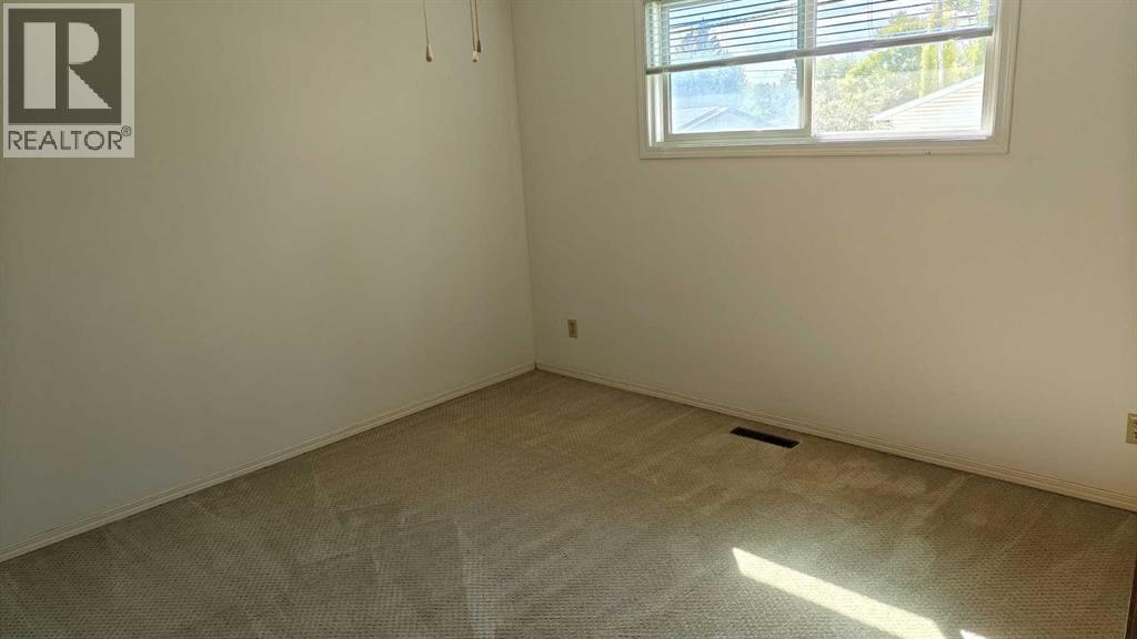 Photo 10 of 4315 Charleswood Drive Nw, Calgary AB