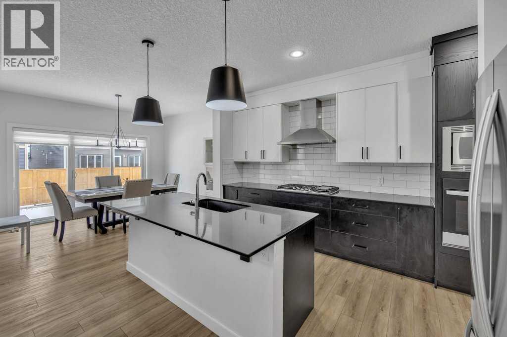 Photo 5 of 1098 Midtown Avenue Sw, Airdrie AB