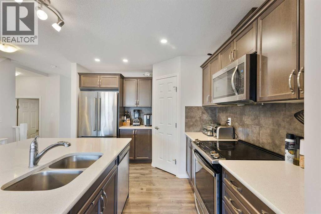 Photo 5 of 234 Hillcrest Square Sw, Airdrie AB