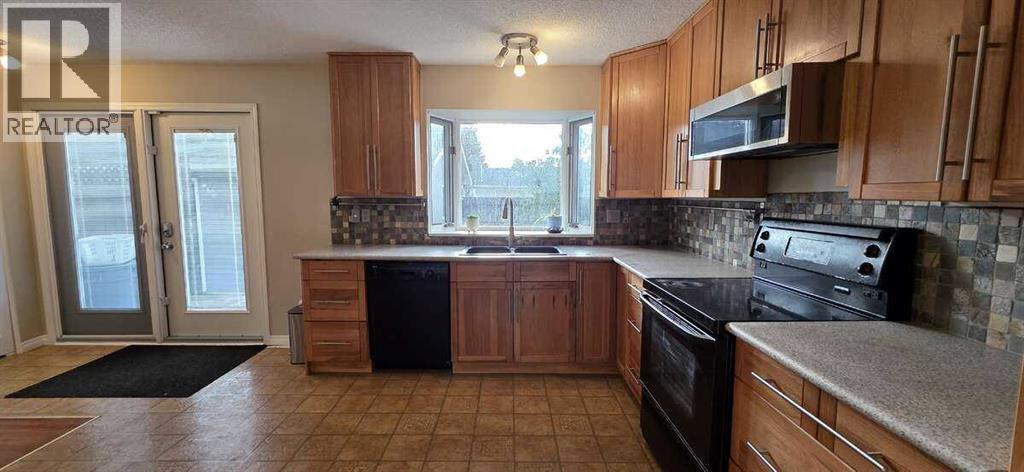 Photo 24 of 640 Willowburn Crescent Se, Calgary AB