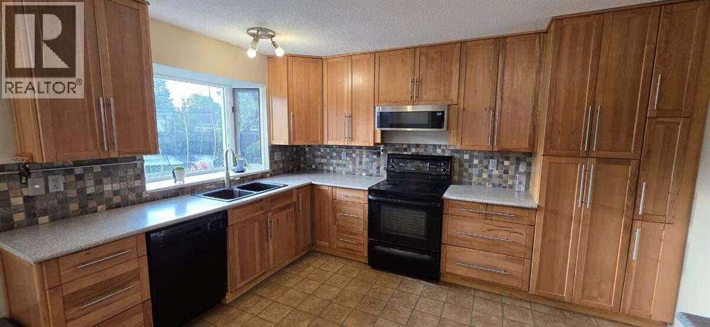 Photo 26 of 640 Willowburn Crescent Se, Calgary AB