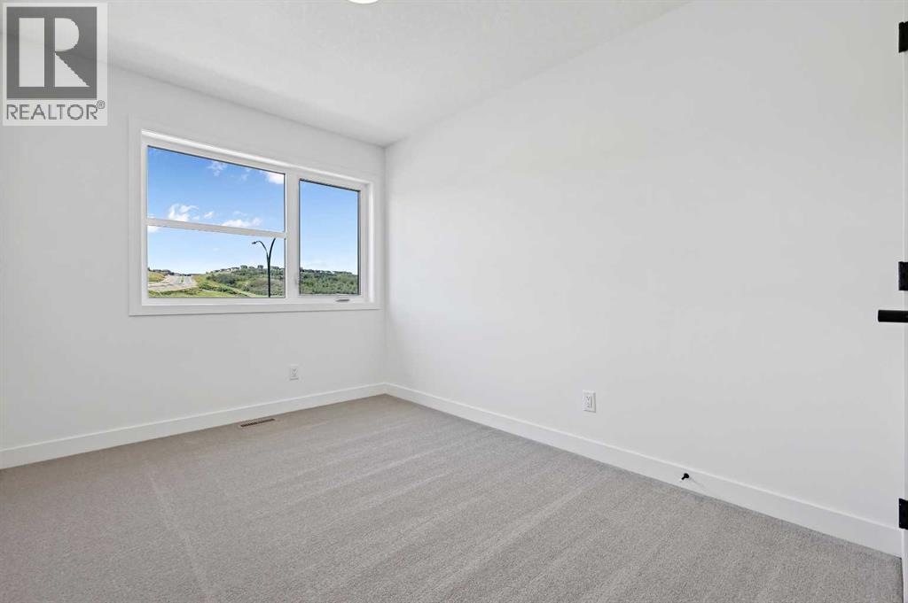 Photo 15 of 894 Wolf Willow Boulevard Se, Calgary AB