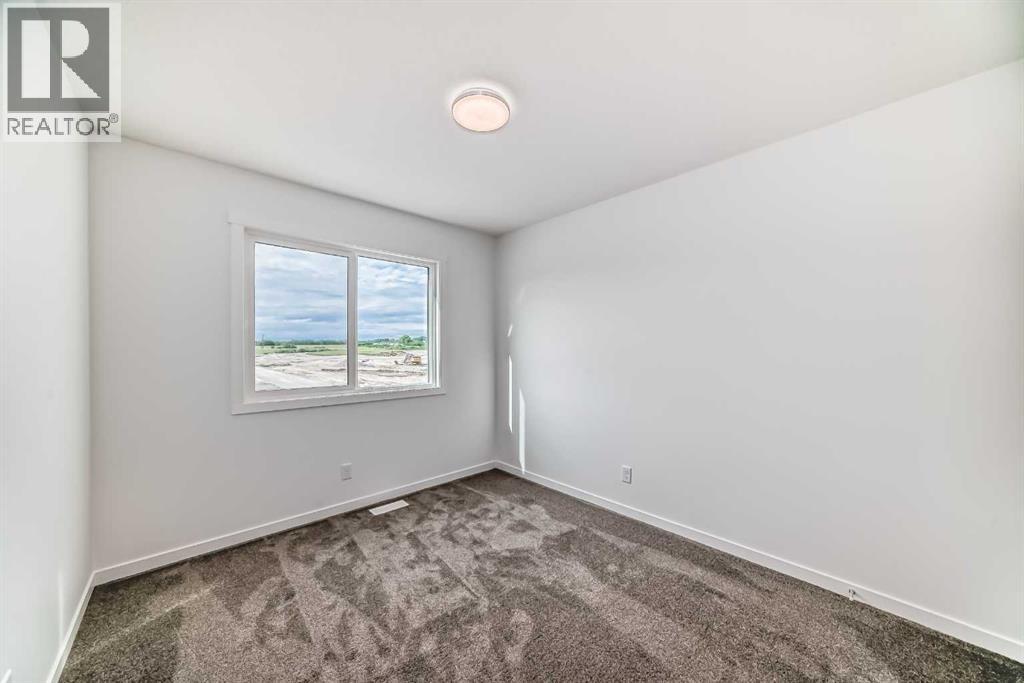 Photo 24 of 72 Wedderburn Drive, Okotoks AB