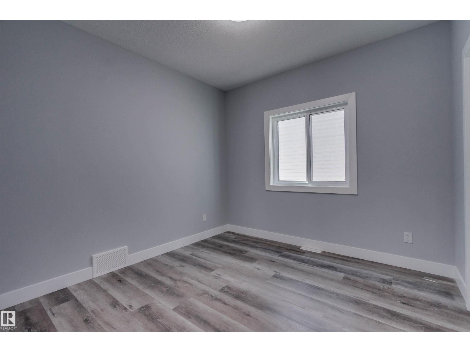 Photo 5 of 829 Morris Av, Leduc AB