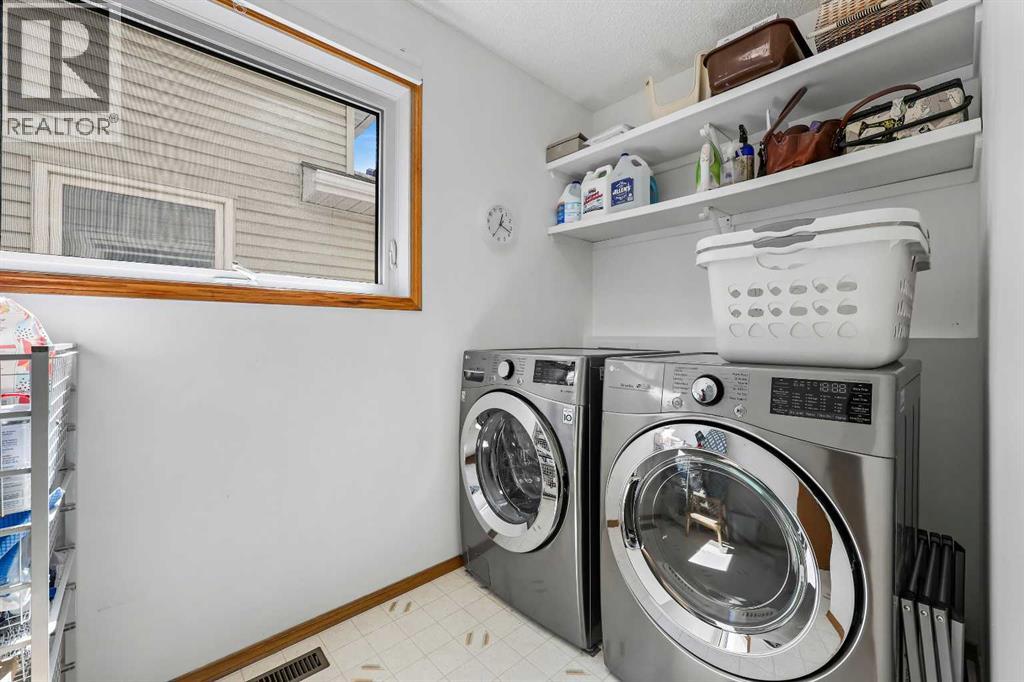 Single Family House for Sale in  Hawkmount Close NW Hawkwood Calgary 