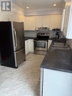Bright kitchen with Stainless appliances