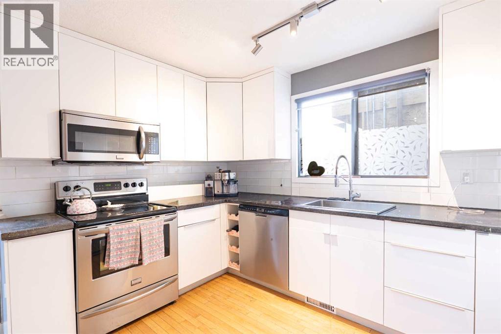 Single Family House 4 Level for Sale in   Avenue NW Montgomery Calgary 