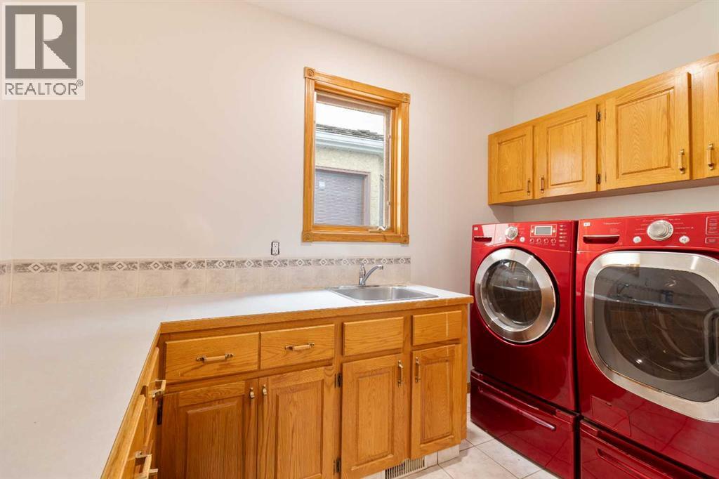 Single Family House for Sale in  Signal Hill Mews SW Signal Hill Calgary 