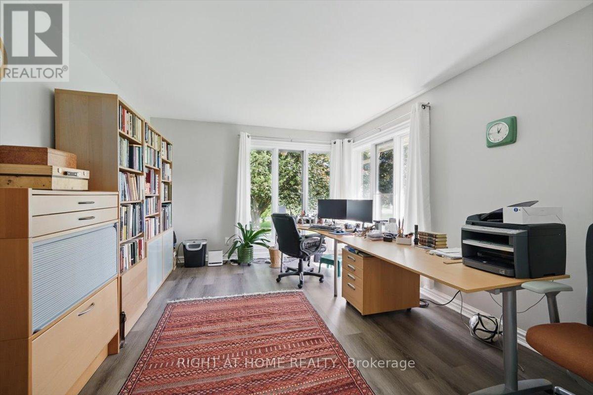 Main floor seperate office with corner windows