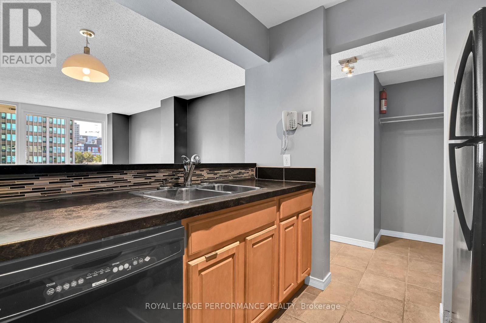 Kitchen opens to Living and Dining Rooms