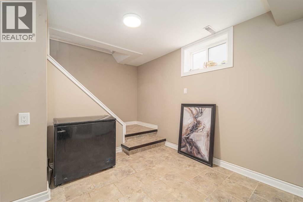 Single Family House Bungalow for Sale in  b Avenue S Victoria Park Lethbridge 