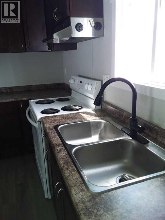 Single Family House Mobile Home for Sale in    Avenue SE Red Carpet Calgary 