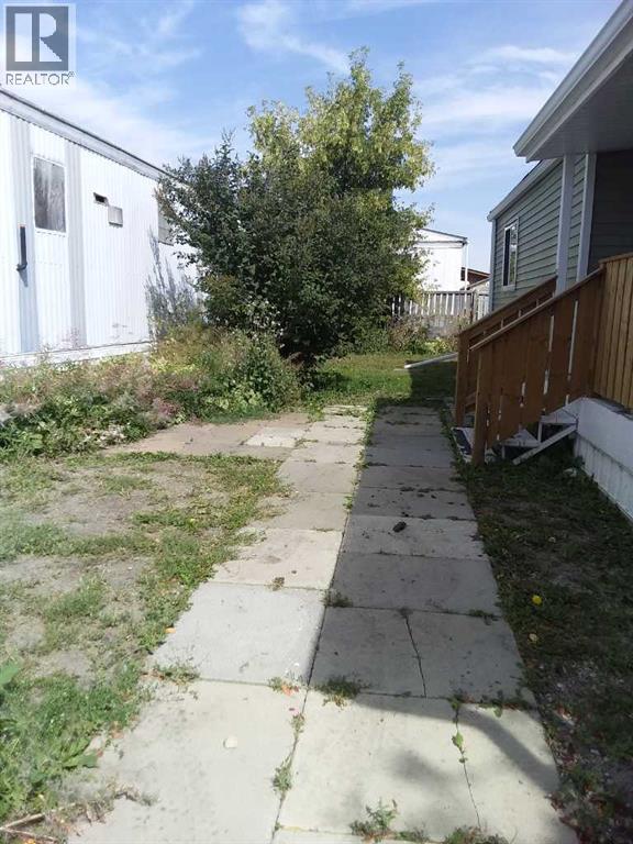 Single Family House Mobile Home for Sale in    Avenue SE Red Carpet Calgary 