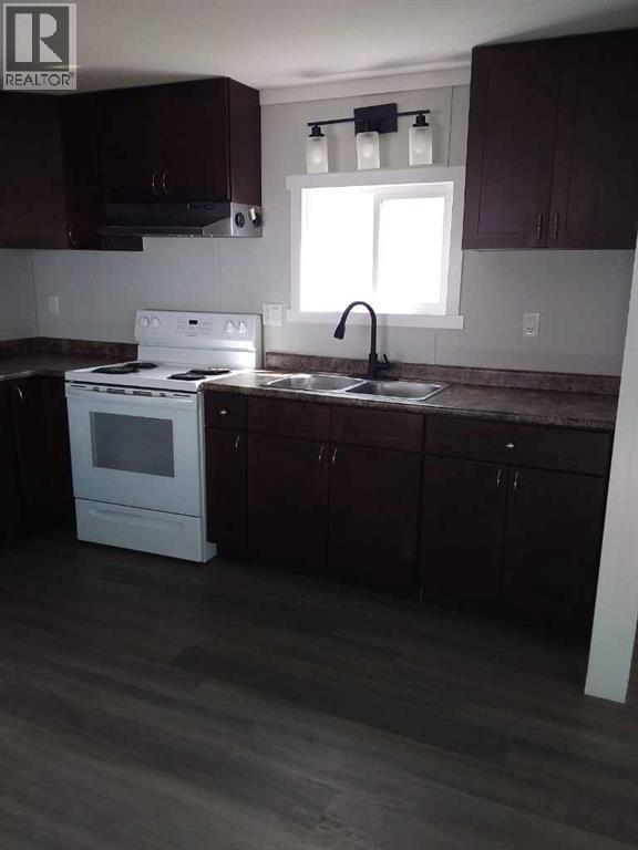 Single Family House Mobile Home for Sale in    Avenue SE Red Carpet Calgary 