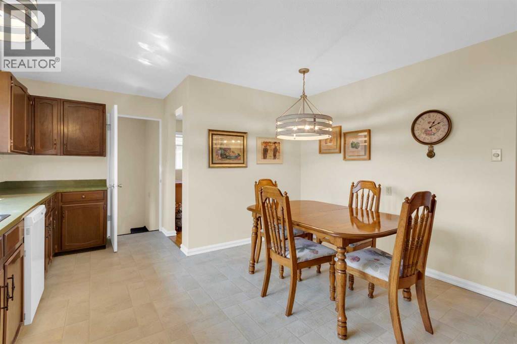 Single Family House Bungalow for Sale in  Lake Emerald Road SE Lake Bonavista Calgary 