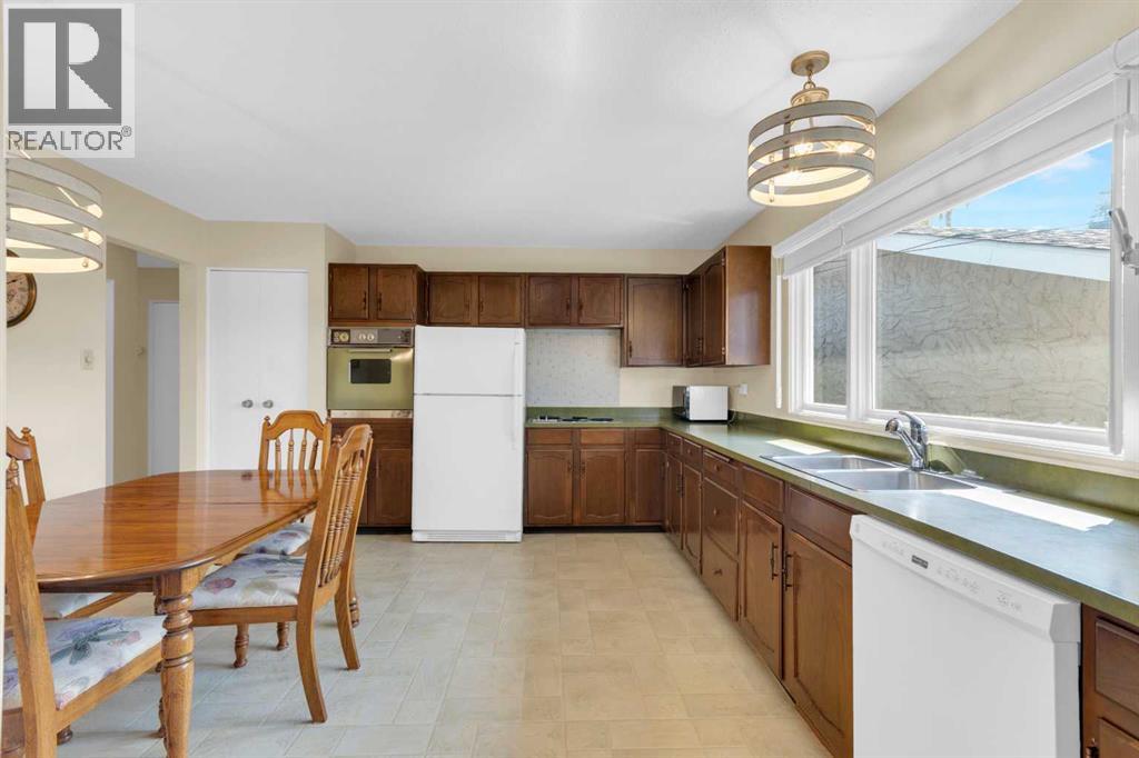 Single Family House Bungalow for Sale in  Lake Emerald Road SE Lake Bonavista Calgary 