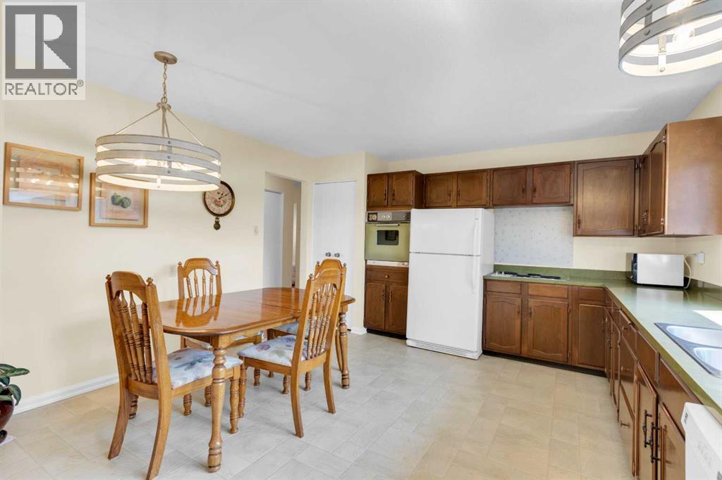 Single Family House Bungalow for Sale in  Lake Emerald Road SE Lake Bonavista Calgary 