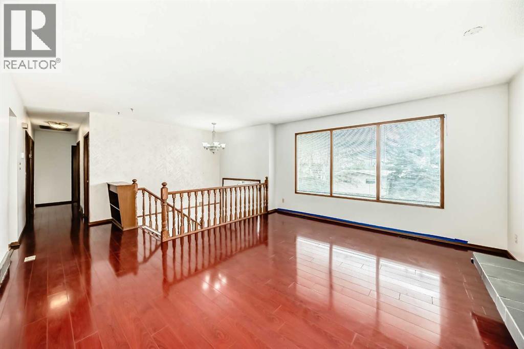 Single Family House Bi-level for Sale in  Barron Drive NW Brentwood Calgary 