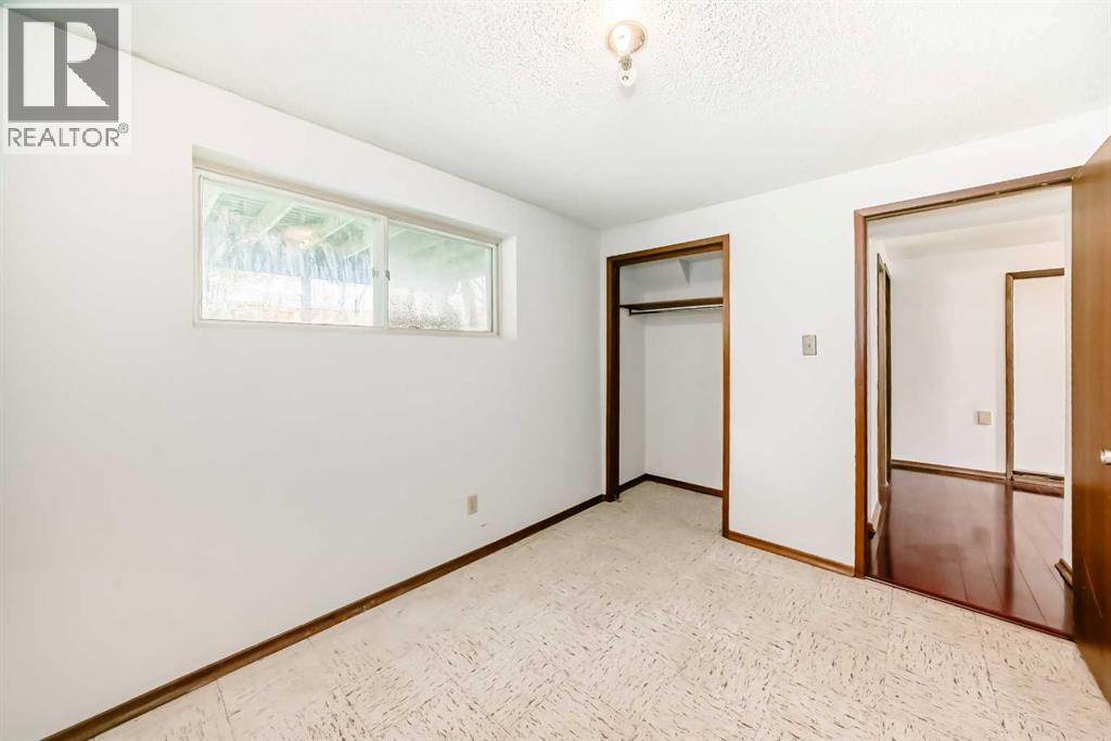 Single Family House Bi-level for Sale in  Barron Drive NW Brentwood Calgary 