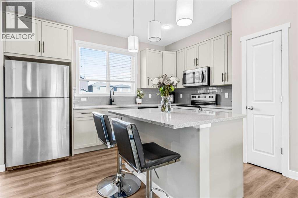 Single Family House for Sale in  Belmont Avenue SW Belmont Calgary 
