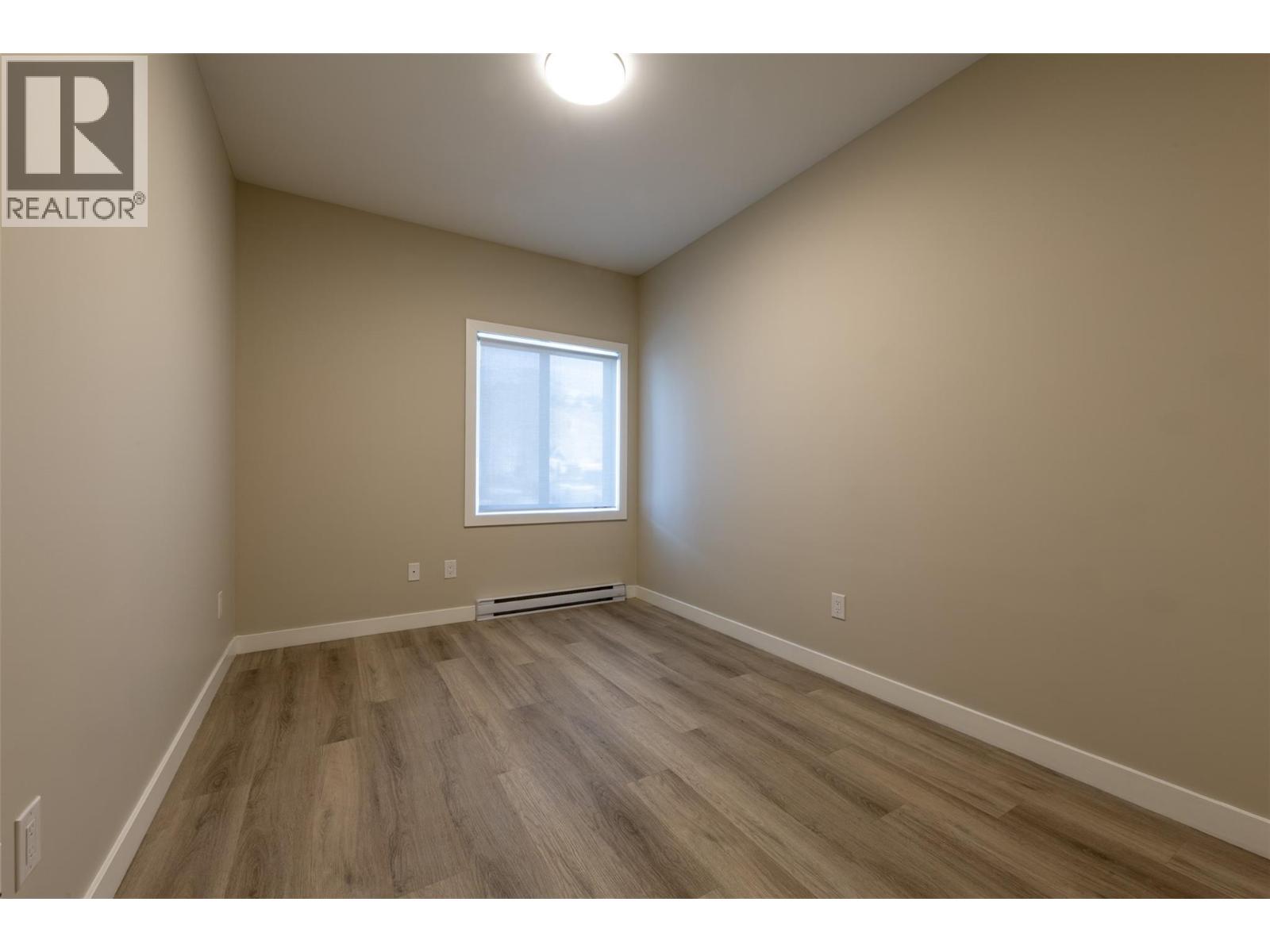 #203 1200 11TH AVENUE N - 38