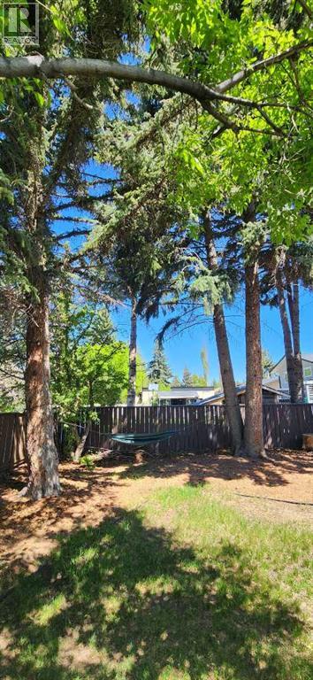 Single Family House Bungalow for Sale in  Vallance Crescent NW Varsity Calgary 