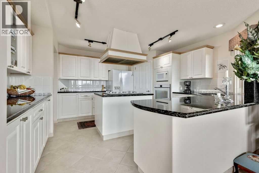 Single Family House Bungalow for Sale in  Signal Hill Drive SW Signal Hill Calgary 