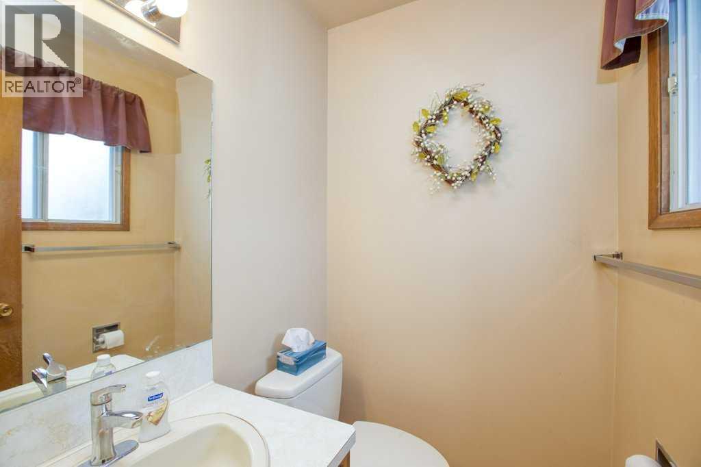 Single Family House Bi-level for Sale in  Silverthorn Way NW Silver Springs Calgary 