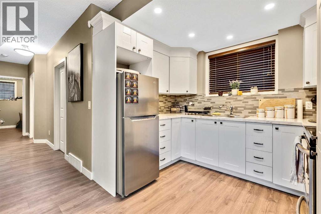 Single Family House Bi-level for Sale in  Covecreek Place NE Coventry Hills Calgary 