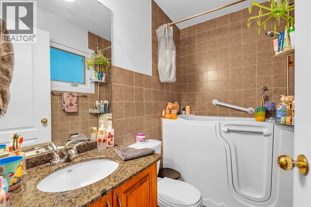 Single Family House Bungalow for Sale in  Acadia Drive SE Lake Bonavista Calgary 