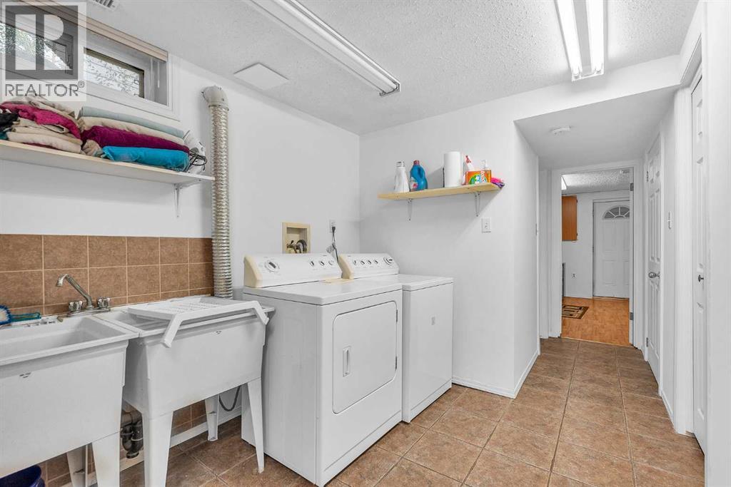 Single Family House Bungalow for Sale in  Acadia Drive SE Lake Bonavista Calgary 