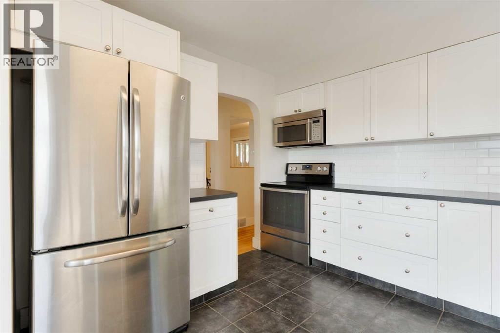 Single Family House Bungalow for Sale in  Tavender Road NW Thorncliffe Calgary 