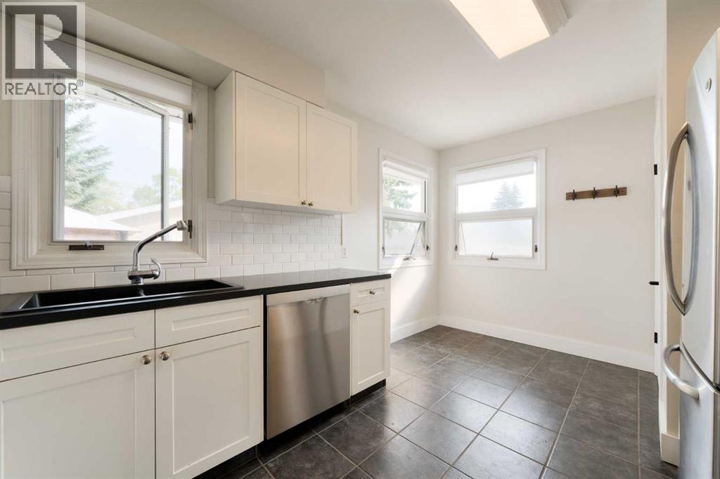 Single Family House Bungalow for Sale in  Tavender Road NW Thorncliffe Calgary 