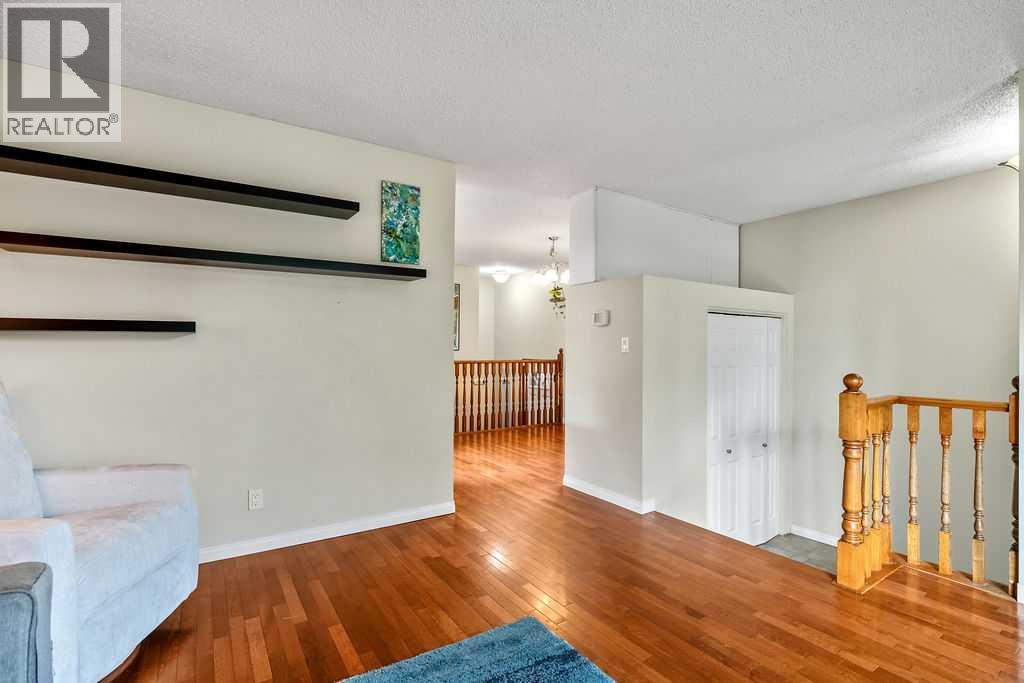 Single Family House Bi-level for Sale in  Riverbirch Place SE Riverbend Calgary 