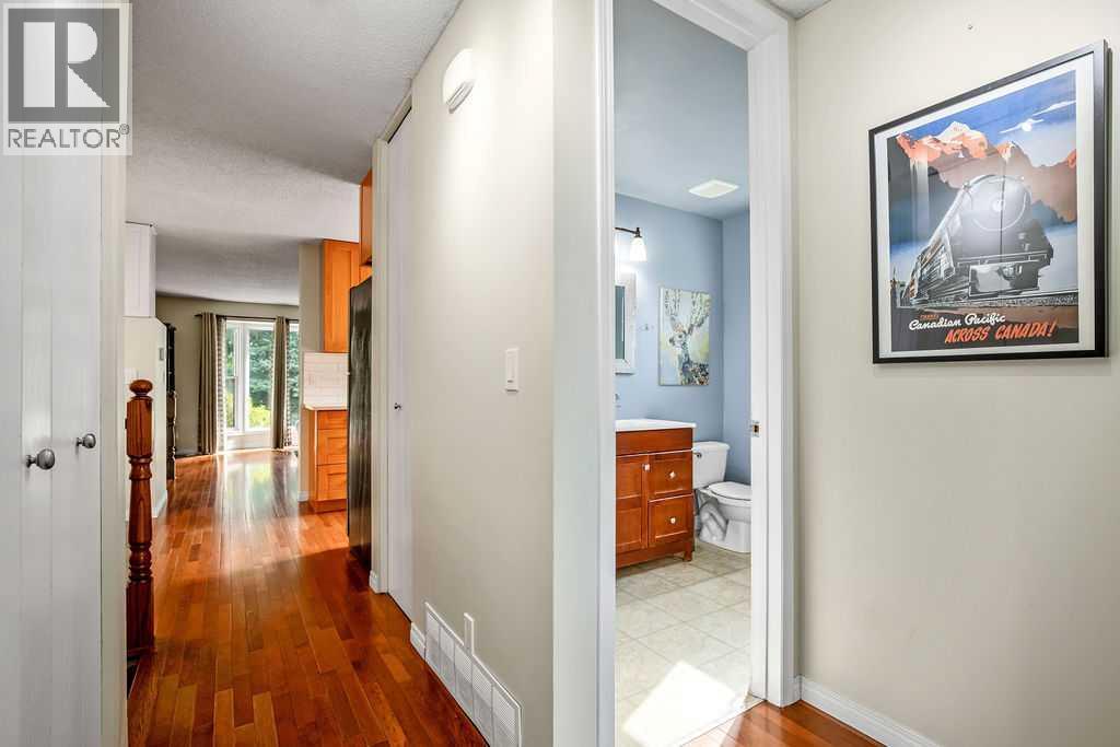 Single Family House Bi-level for Sale in  Riverbirch Place SE Riverbend Calgary 