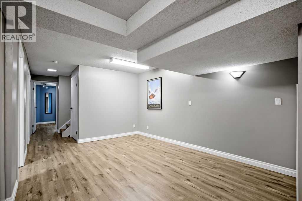 Single Family House Bi-level for Sale in  Riverbirch Place SE Riverbend Calgary 