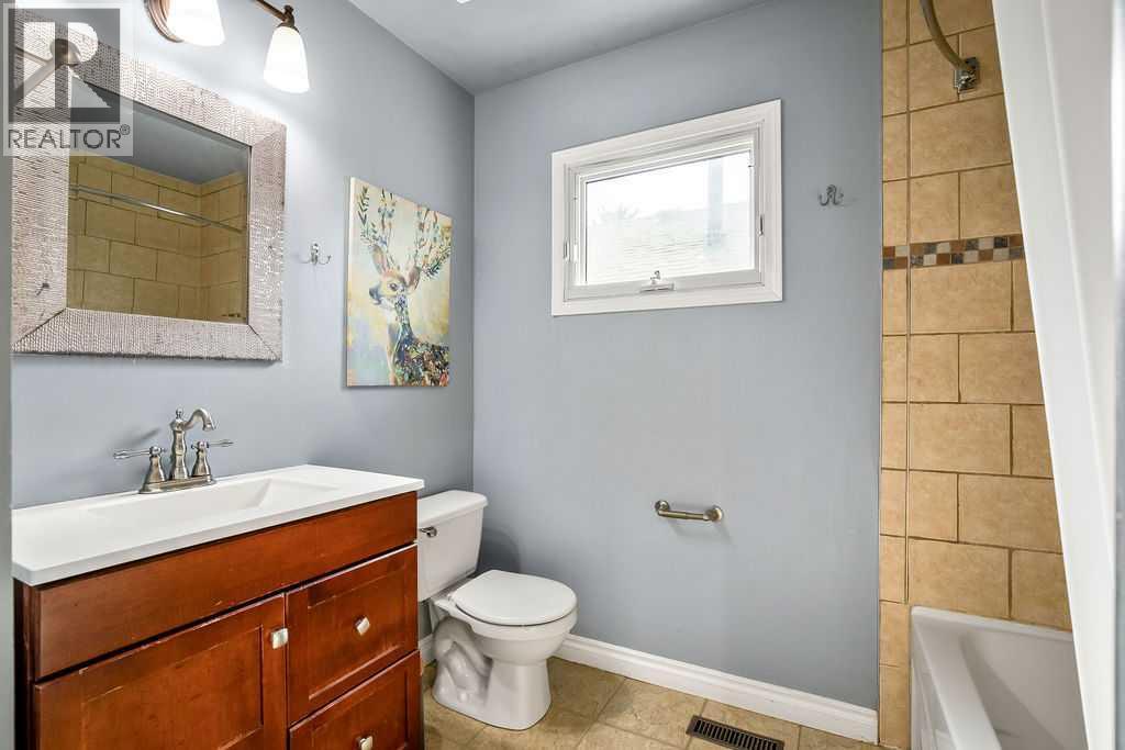 Single Family House Bi-level for Sale in  Riverbirch Place SE Riverbend Calgary 
