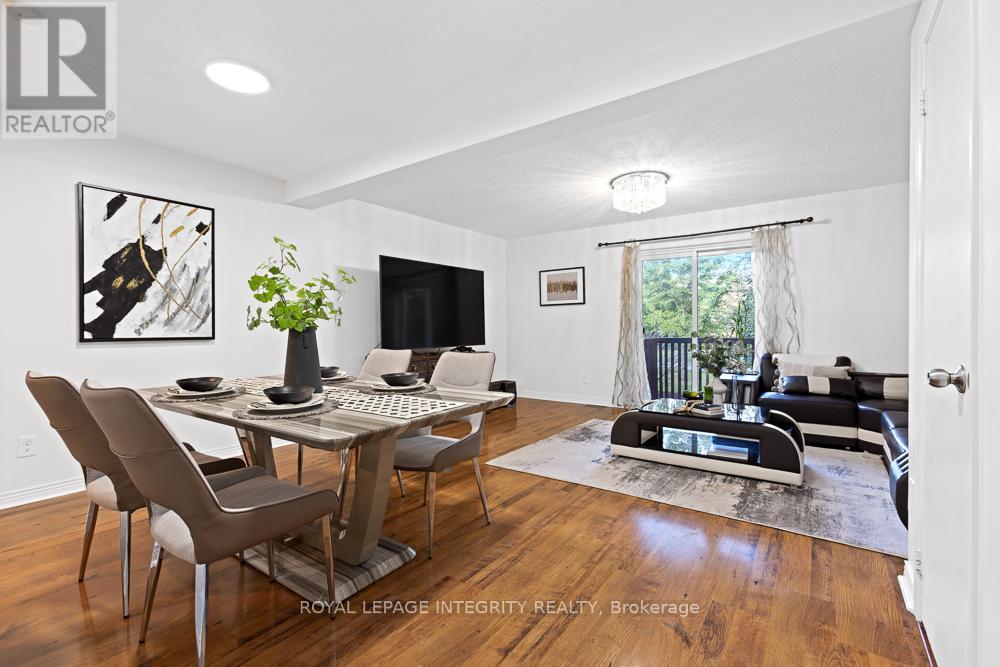 open concept living and dining access to backyard