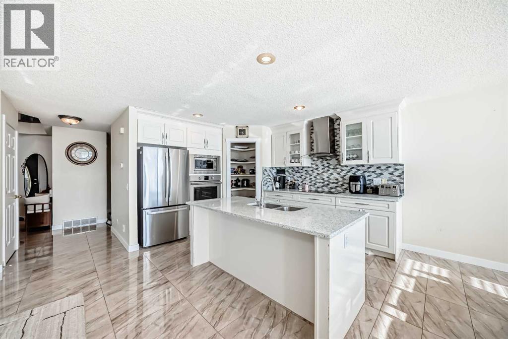 Single Family House for Sale in  Covette Bay NE Coventry Hills Calgary 