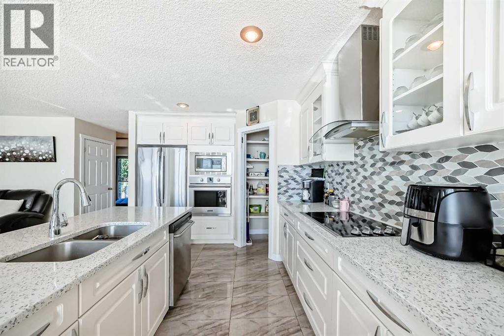 Single Family House for Sale in  Covette Bay NE Coventry Hills Calgary 