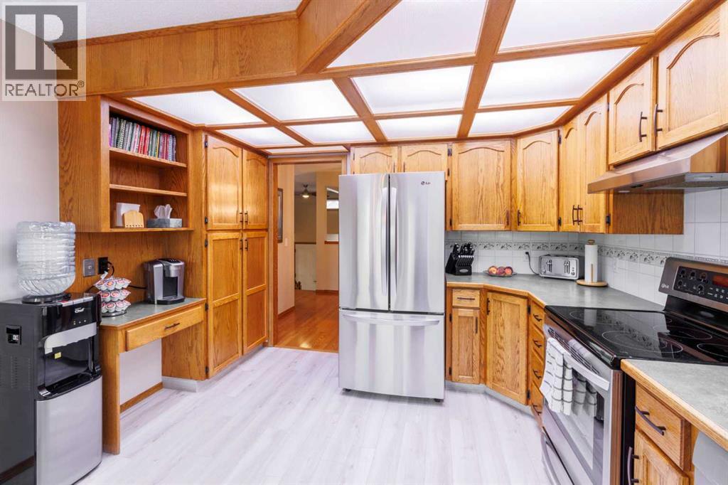 Single Family House 4 Level for Sale in  Macewan Ridge Gate NW MacEwan Glen Calgary 
