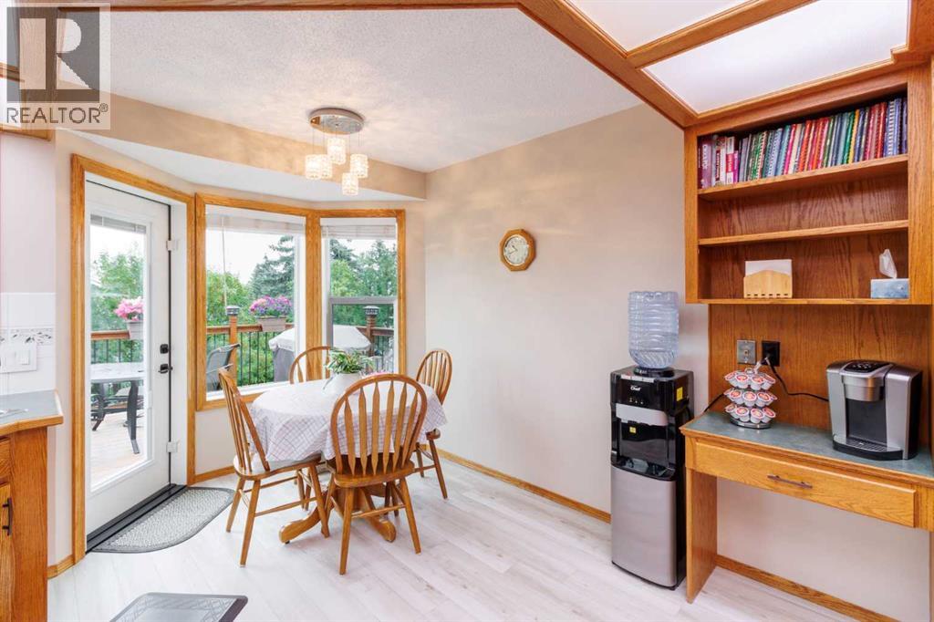 Single Family House 4 Level for Sale in  Macewan Ridge Gate NW MacEwan Glen Calgary 