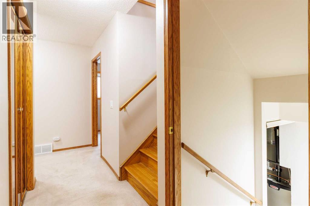 Single Family House 4 Level for Sale in  Macewan Ridge Gate NW MacEwan Glen Calgary 