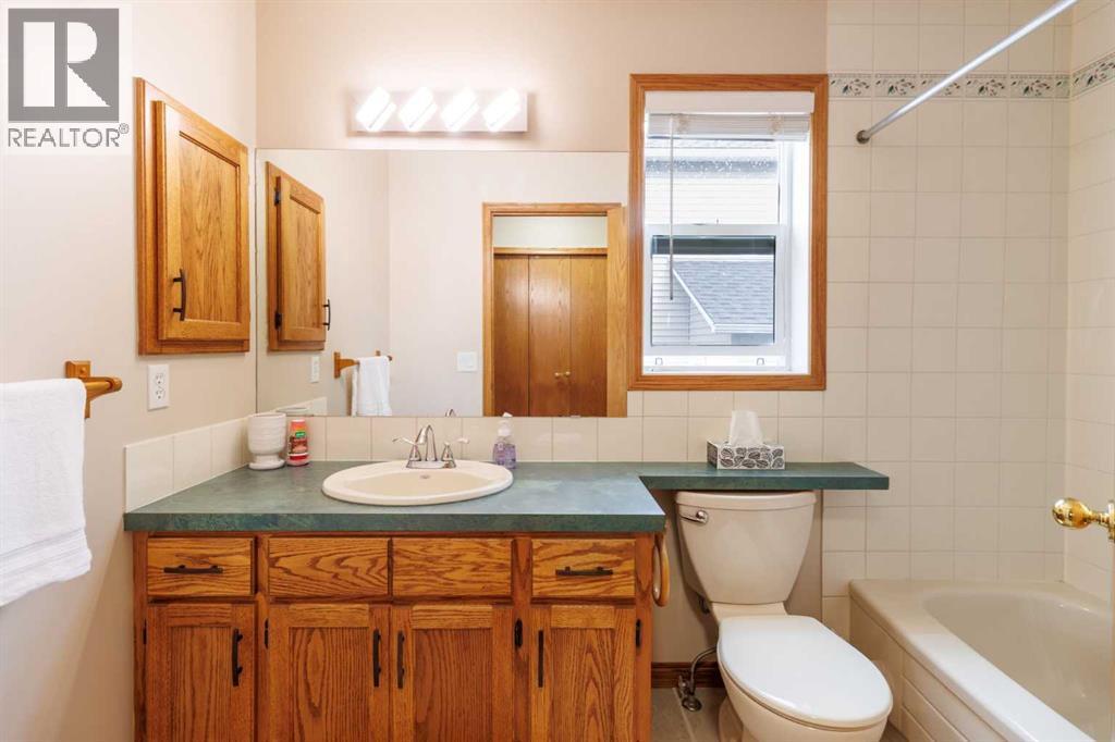 Single Family House 4 Level for Sale in  Macewan Ridge Gate NW MacEwan Glen Calgary 