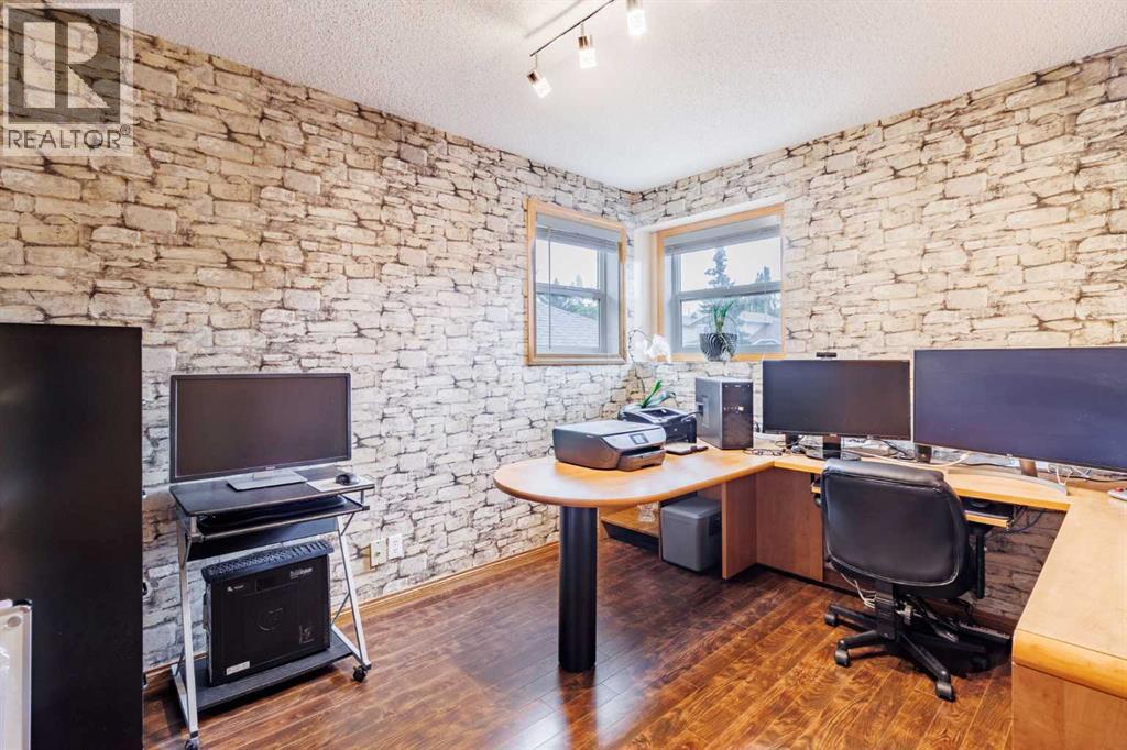 Single Family House 4 Level for Sale in  Macewan Ridge Gate NW MacEwan Glen Calgary 