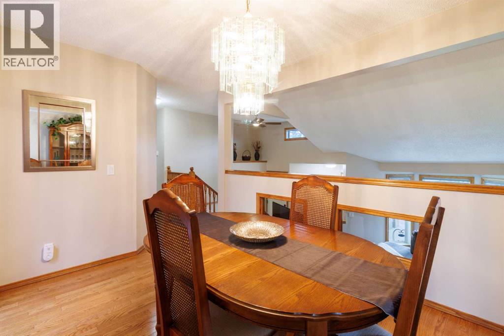 Single Family House 4 Level for Sale in  Macewan Ridge Gate NW MacEwan Glen Calgary 