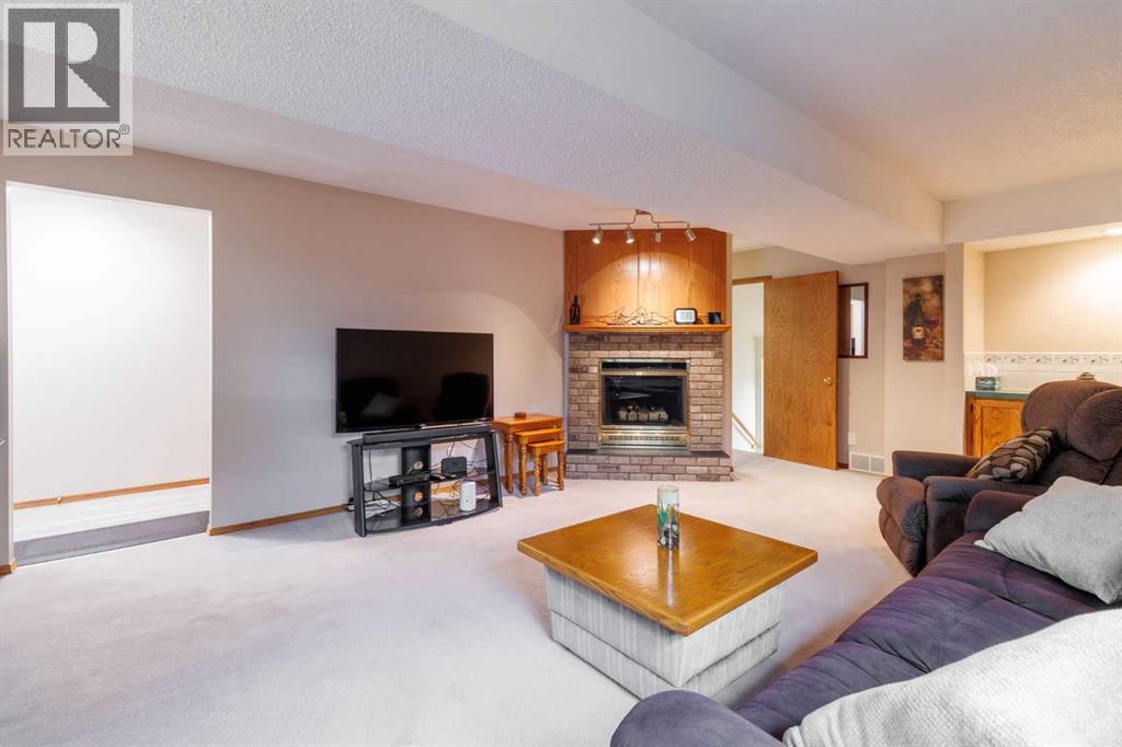 Single Family House 4 Level for Sale in  Macewan Ridge Gate NW MacEwan Glen Calgary 